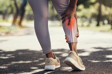 Woman, fitness and pain or injury on legs while running on outdoor road for exercise, workout and training. Sport person with red anatomy calf overlay for and massage for joint, accident or arthritis © Charnelle VDR/peopleimages.com