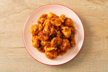 fried meatballs with spicy dipping sauce