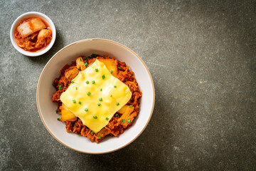 kimchi fried rice with pork and topped cheese