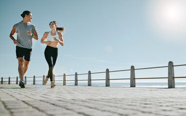Couple, fitness and running by beach on mockup for exercise, workout or cardio routine together....