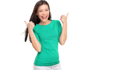 Thumbs up happy excited woman isolated on white background in green t-shirt. Cheerful joyful and elated girl looking at camera. Multiracial Asian Caucasian girl in her twenties.
