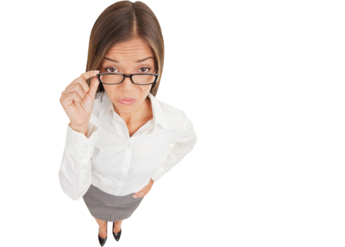 Suspicious upset angry and funny businesswoman taking off her glasses, standing isolated on white background in high angle. Multiracial Asian Caucasian business woman.
