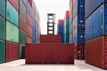 Fototapeta premium Container boxes and folklift for adjust box in yard and logistic service
