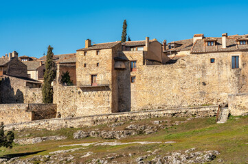 Medieval houses and walls of the old town of Pedraza located on a hill in the fields of Castile, Spain.