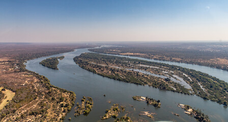 Wide-angle shot of the upper Zambezi river, just before plunging down Victoria Falls.