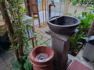 Two Hand Wash basin in a row for kid and adult in the terrace with plants arounds
 - obrazy, fototapety, plakaty