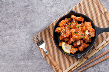 Top Table View of Korean fried chicken, While freshly cooked, appetizing, with Space for Your Text.