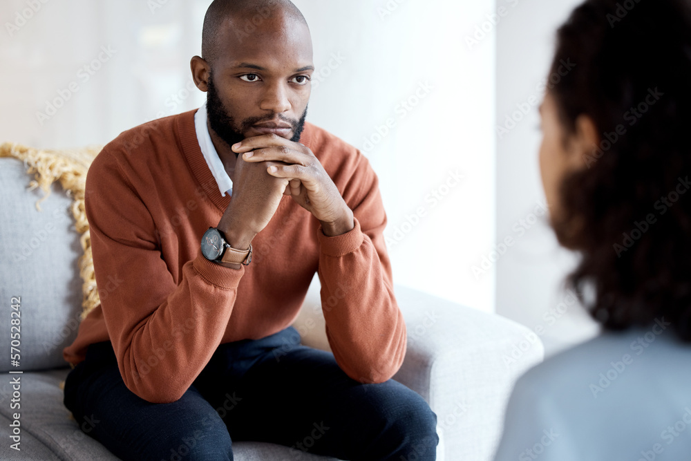 Canvas Prints Mental health, depression and black man with a therapist for grief, depression or anxiety counseling. Psychology, sad and professional psychologist helping a African male patient in a clinic session.