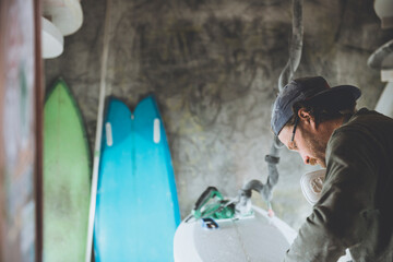 Surfboard Shaper refining a new design