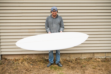 Surfboard Shaper refining a new design