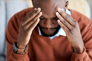 Headache, stress and sad with black man on sofa for burnout, mental health and anxiety. Depression,...
