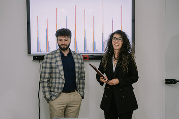 Fototapeta premium Beautiful Caucasian presenters