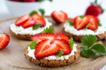 Homemade healthy toast with strawberry and cream cheese. Tasty breakfast. Clean eating, dieting or recipe of healthy snack sandwich for vegaterian.