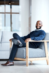 Fototapeta premium Portrait, black man in office and waiting on chair, smile and confident for job interview, resting and relax. Face, African American male employee and entrepreneur in workplace, happiness and joyful