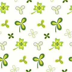 Seamless pattern of hand drawn and doodle shamrock and clover leaves on isolated background. Simple design for St. Patrick's day celebration, party decoration, scrapbooking, home decor, textile.