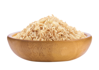 Raw brown rice in wooden bowl isolated. PNG transparency