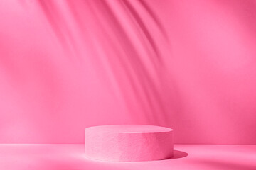 Round podium pedestal on the table and shade from the palm tree and sunshine on the wall. Minimal...