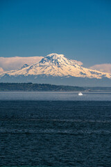 Mount Rainier Hovering Over Puget Sound With a Boat