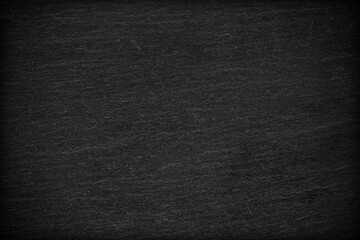 Dark grey black slate background or texture.