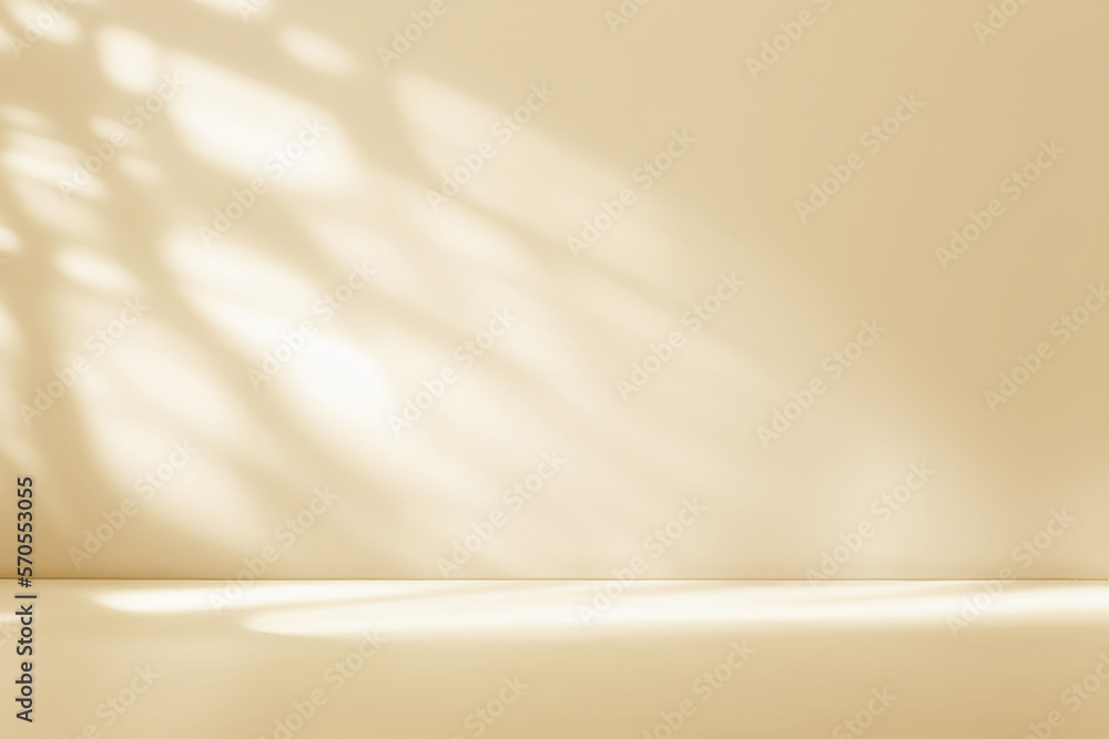Aufkleber Minimalistic abstract gentle light beige background for product presentation with light andand intricate shadow from the window and vegetation on wall.