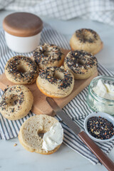 freshly baked whole grain bagels. heap of fresh baked bagels