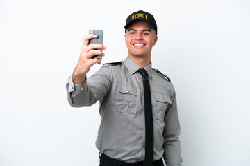 Young caucasian security man isolated on white background making a selfie