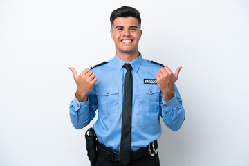 Young police caucasian man isolated on white background with thumbs up gesture and smiling