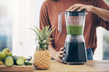 Blender, green smoothie and woman hands for diet, detox and healthy morning breakfast in kitchen with fruit. Vegetables, food and young person or nutritionist with nutrition drink for vegan protein