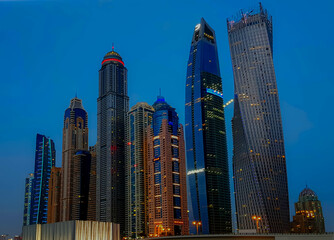 Fototapeta na wymiar Skyscrapers in marina in Dubain in the night