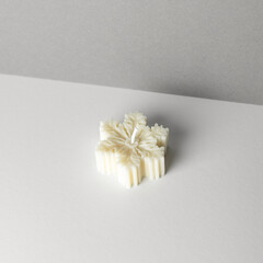 A snowflake-shaped candle for home decor.