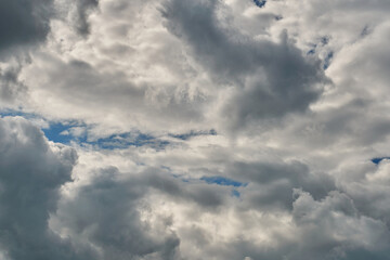 A terrible black cloud hangs in the sky before the rain. Bad weather. Hurricane and thunder over...
