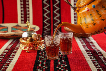 Arabic Traditional Hospitality (Saudi Arabia). Bedouin lifestyle, Iconic Abrian fabric is graced...
