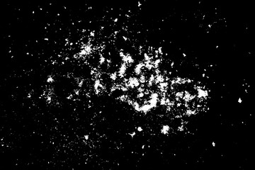 White powder on a black background.
Explosion Debris and Dust Particles.