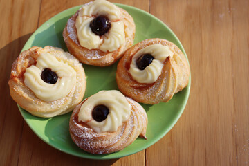 Italian traditional fried Zeppole for St. Joseph (Father’s day). Homemade sweet pastry with...