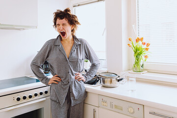 Fatigue and seasonal depression, household chores routine, young lonely woman morning