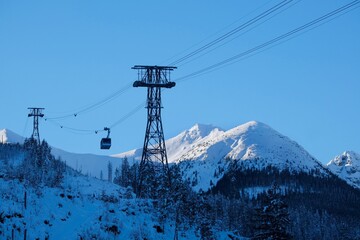 Ropeway to Kasprowy Wierch Peak in Tatras Mountains in beautiful winter scenery in morning light, famous place in Tatras, Poland. Tatra National Park