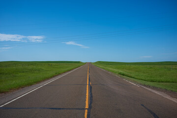 Grasslands of North Dakota seen here on a two lane highway