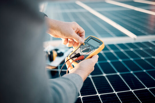 Solar panels, multimeter and engineering hands for voltage check, installation or maintenance. Sustainability, eco friendly or energy saving technology, contractor inspection or troubleshooting tools