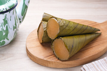 Clorot, Indonesian traditional cake made from rice flour with coconut milk, wrapped in young...