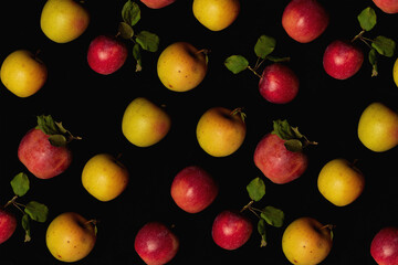 Fruit pattern from apples with black surface on background