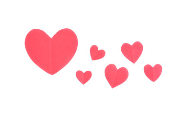 Fototapeta na wymiar Red Paper Hearts on white background, Heart shape papercut, Happy Valentine's day