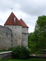 Tallinn, Estonia, 26_05_2019 - Towers of the old town wall with pointed roofs
