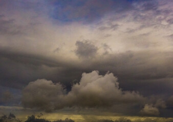 Fototapeta na wymiar umm qais - irbid, jordan 06- Feb- 2023 - stormy sky and layers of clouds during sunset