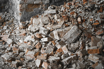 old broken red brick, destroyed wall of the building