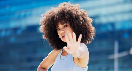 Fitness, dance and black woman in urban city with energy, hand moving and energy portrait of gen z youth. Natural hair, afro and workout, exercise or hip hop person or model on blue building