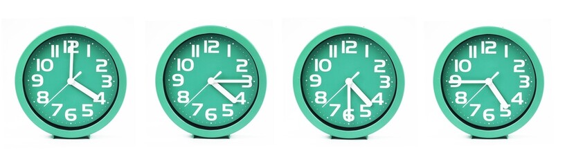 close up of a set of green clocks showing the time; 4, 4.15, 4.30 and 4.45 p.m or a.m. Isolated on white background - obrazy, fototapety, plakaty
