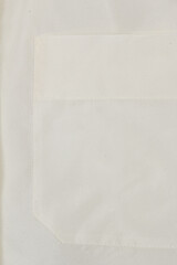 white fabric with pocket