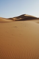 Fototapeta na wymiar Beautiful Erg Chigaga dune on Sahara desert in MOROCCO - vertical