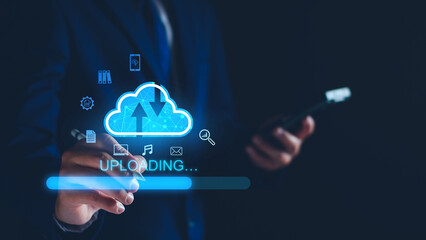 Data upload to cloud storage computing concept. Man using smartphone and computer to upload and...