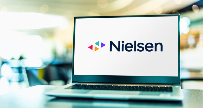 Laptop computer displaying logo of Nielsen Media Research